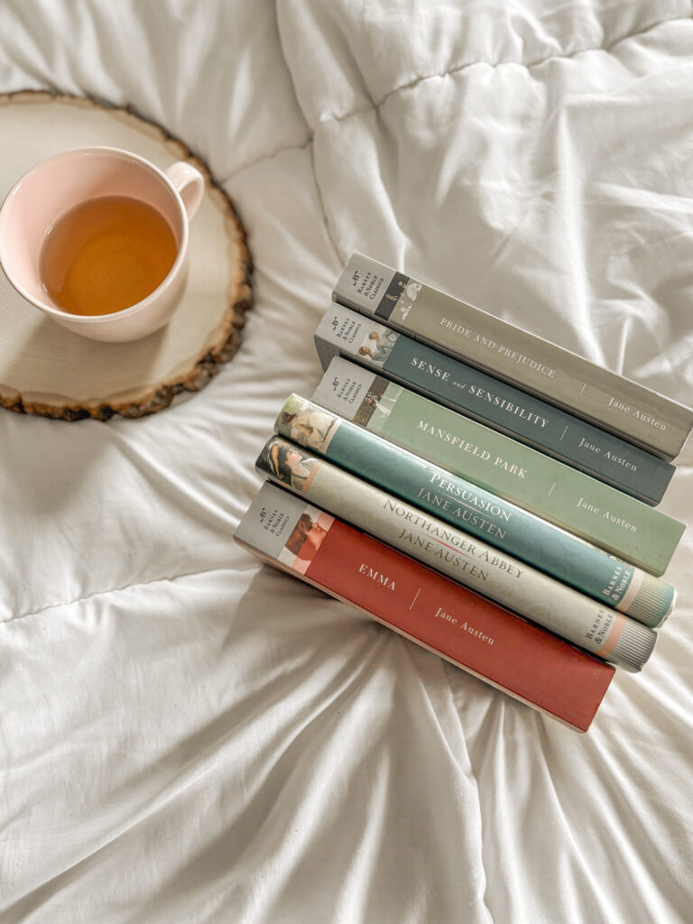 Setting reading goals with a cup of tea and a stack of Jane Austen books for inspiration