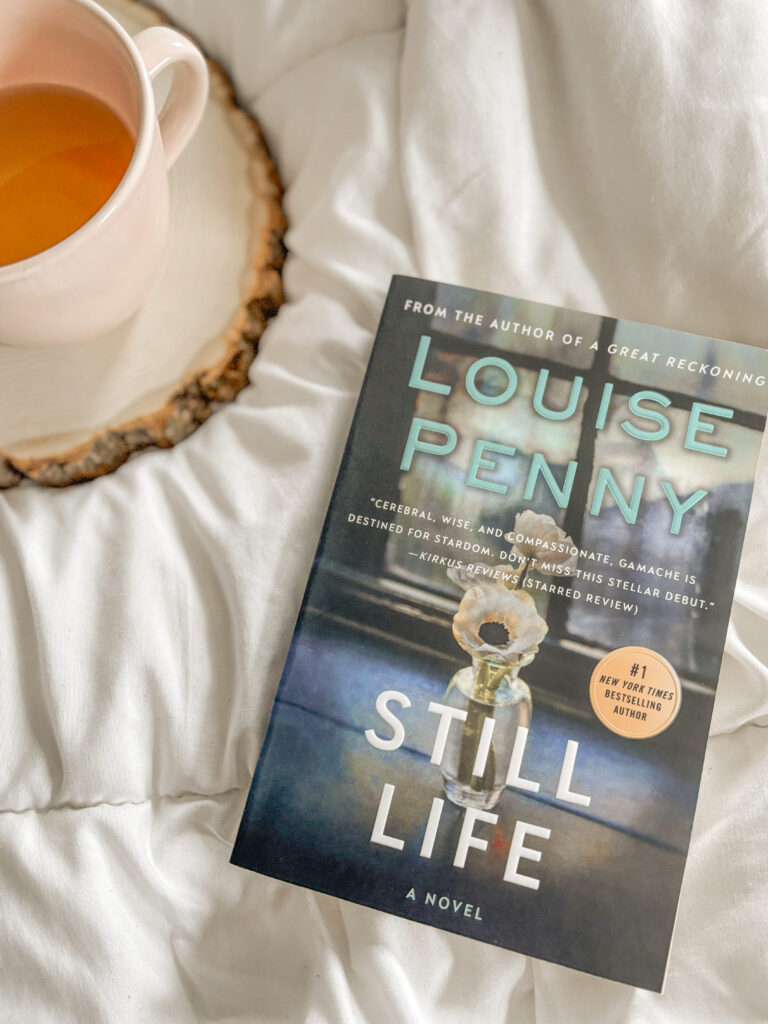 Crafting reading goals with a calming cup of tea and Still Life by Louise Penny as motivation